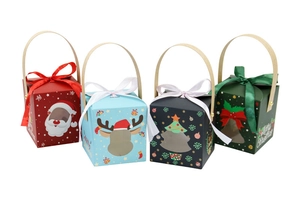 Christmas gift boxes with handles and ribbon bows in red, blue and green colors