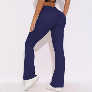 Detail of high waist dark blue yoga pants with scrunch butt lift and flared leg design