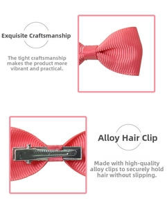Detail showing pink ribbed ribbon texture and durable silver alloy clip for girls
