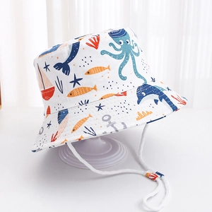 Kids sun hat with ocean creature patterns and adjustable windproof cord on white base
