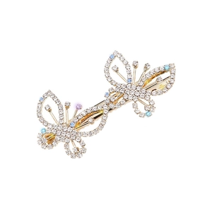 Elegant gold bow hair clip featuring sparkling rhinestones and colorful crystal accents