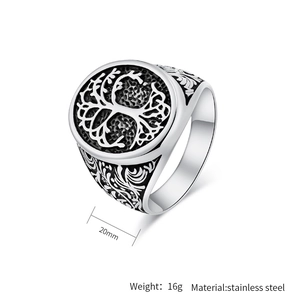 Macro shot of stainless steel Tree of Life ring with vintage engravings and 20mm diameter