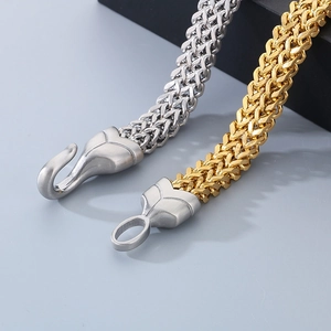 Detail of fish scale pattern stainless steel bracelet with matte creative hook closure