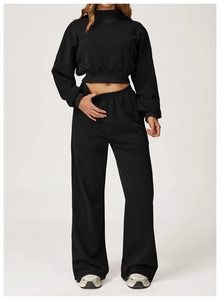 Full-body shot of a black high-waisted wide-leg tracksuit set in a modern minimalist style