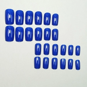 24pcs set of glossy deep blue press-on nails with various sizes for nail extensions