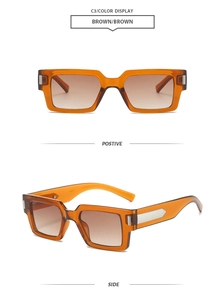 Detail view of amber retro square sunglasses with silver arrow metal ornaments