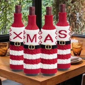 Set of 4 Christmas knitted wine bottle covers with XMAS letters and belt details