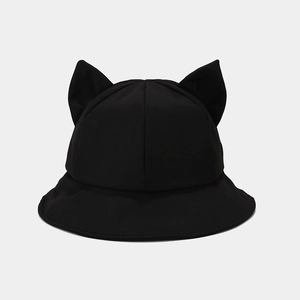 Detailed close-up of 3D cat ear decoration on black cotton bucket sun hat