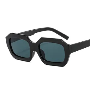 Retro small frame sunglasses with chunky black geometric frames and dark tinted lenses