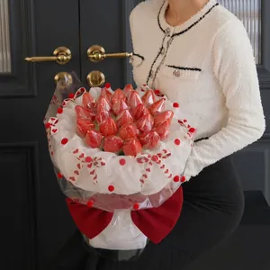 Exquisite strawberry bouquet with heart ribbons and large red velvet bow for Christmas