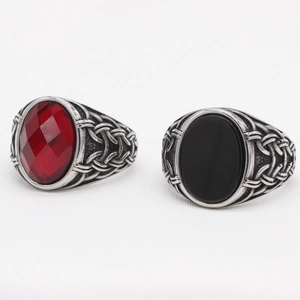 Retro Viking rings set with faceted red gemstone and oval black onyx in vintage silver