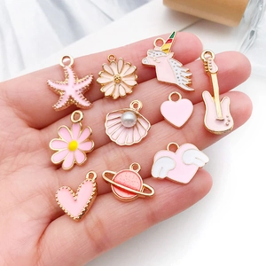 Pink enamel charms set with unicorn and shell shapes for DIY jewelry making
