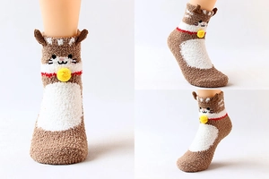 Detailed view of cat-themed coral fleece socks in brown and white with leg model