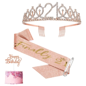 Detailed 21st birthday set with rose gold rhinestone tiara, sash, and cake topper