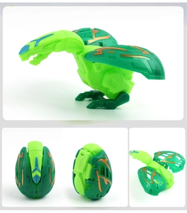 Detail showing green and gold dinosaur egg toy transforming into a dragon robot