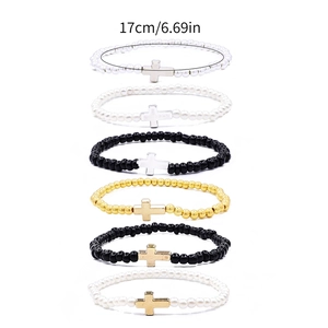 Set of 6 elastic bead bracelets with cross pendants and faux pearls in 17cm circumference