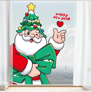 Macro detail of Santa Claus window static sticker with Happy New Year text decor