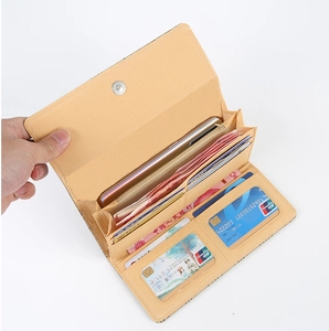 Detail view of large capacity beige wallet with card slots and zipper compartment
