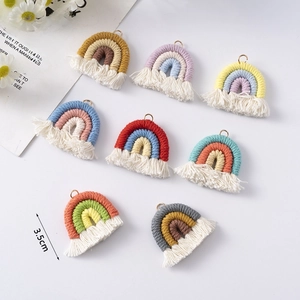 Detailed macro view of 3.5cm handmade cotton rainbow pendants with 8 color schemes