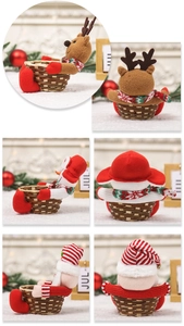 Close-up of woven Christmas candy baskets with plush reindeer and snowman character details