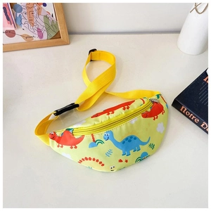 Detail of yellow kids fanny pack with cute cartoon dinosaur print on a stylish desk setting