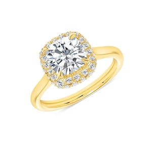 Macro shot of cushion cut gemstone with halo diamonds on a golden luxury ring