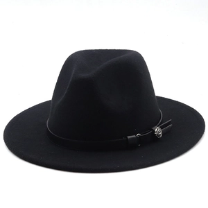 Detail of black wool fedora with leather band and exquisite silver metal rose ornament