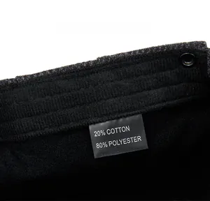 Detail of the warm winter flat cap inner lining showing the care label and fabric texture