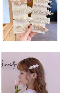Macro detail of elegant pearl hair clips with floral and heart accents for women