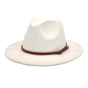 Detail of white wool fedora hat featuring a brown leather belt with a metal buckle
