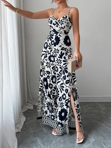 Detailed view of the elegant floral print jumpsuit with a twisted knot and cutout detail