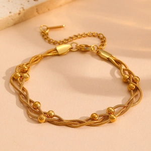 Bracelet triple rang en acier inoxydable doré avec perles élégantes et chaîne serpent
