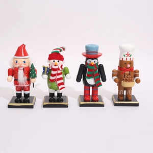 Detailed view of four wooden Christmas nutcrackers including Santa and snowman ornaments
