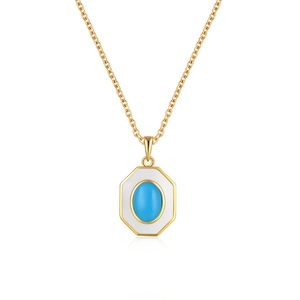 Detailed view of hummingbird pendant with blue turquoise stone and white enamel frame