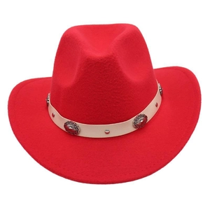 Close-up of red wool felt cowboy hat with vintage silver floral metal conchos on ivory band