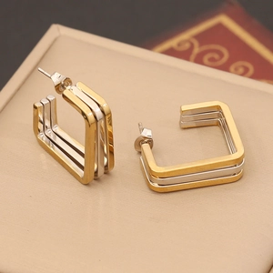 Two-tone geometric square hoop earrings with triple layered stainless steel lines