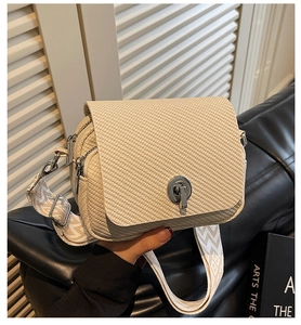 Mini woven shoulder bag for women with twist lock, wide strap, and multi compartments chic.