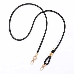 Adjustable black PU leather crossbody strap with gold metal buckles for bags and phones