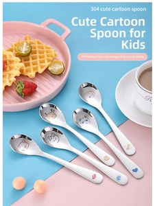 Detailed view of 304 stainless steel children's spoons with cute cartoon animal engravings