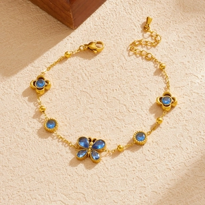 Elegant gold-plated stainless steel chain bracelet with blue butterfly and floral charms
