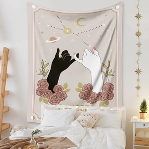 Detailed view of bohemian Cancer zodiac tapestry with pink roses and astrological symbols
