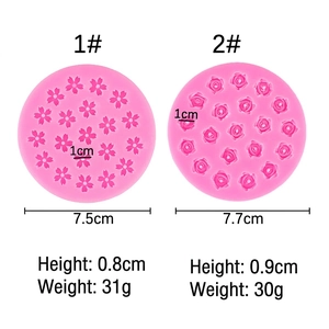 Pink silicone mold for cherry blossom and rose shaped cake decorations and DIY crafts
