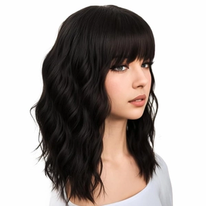 Detail of black medium-length wavy wig with bangs on model in studio lighting