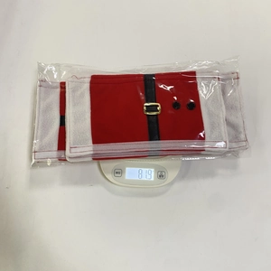Weight measurement of Santa style fabric refrigerator handle covers in plastic packaging