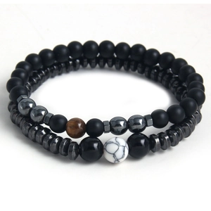 Minimalist matte black stone beaded bracelet set with hematite and tiger eye accents