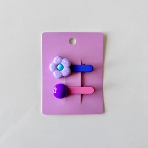 Cute Korean floral and beaded hair clips set for girls on a purple display card
