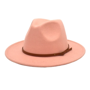 Close-up of pink wool fedora hat with a brown leather belt and metallic buckle detail