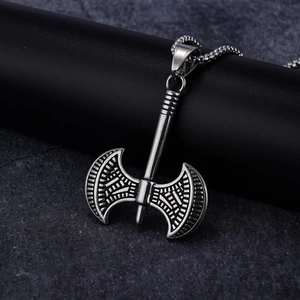 Detailed view of vintage viking double-headed axe pendant in antique silver stainless steel