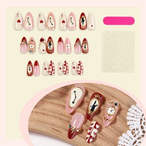Alice in Wonderland almond fake nails set with caramel stars and 24 heart-patterned tips