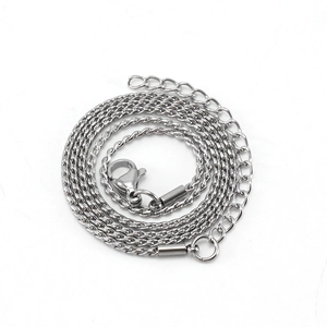 Detailed view of stainless steel S-link chain with lobster clasp and adjustable tail chain